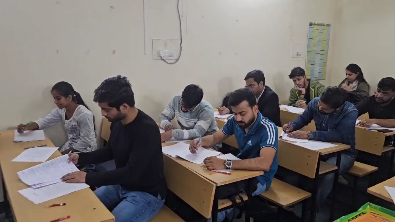 Students appearing for a judiciary answer-writing test at Judex Tutorials Patna